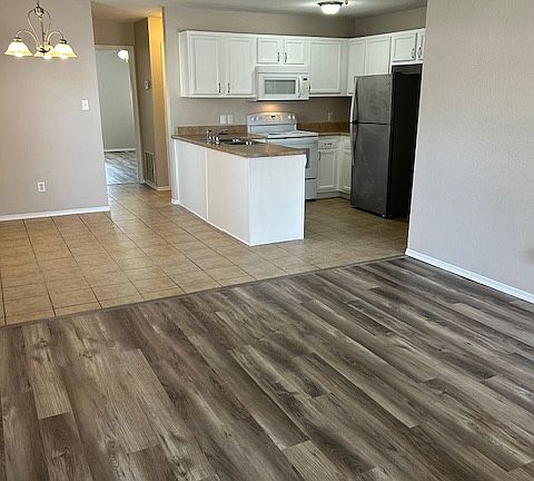 Living Room and Kitchen. All freshly painted!