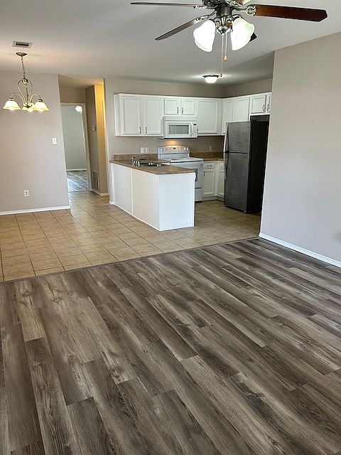 Living Room and Kitchen. All freshly painted!