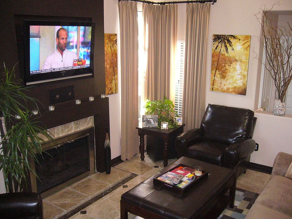 living room, plasma tv, marble floor, custom drapes