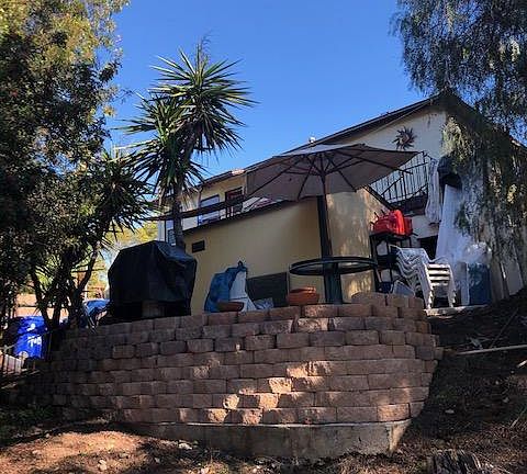 looking up from canyon towards patio