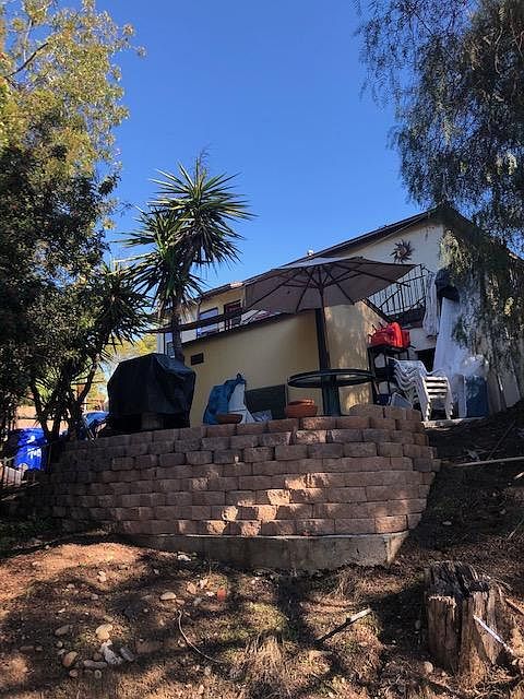 looking up from canyon towards patio