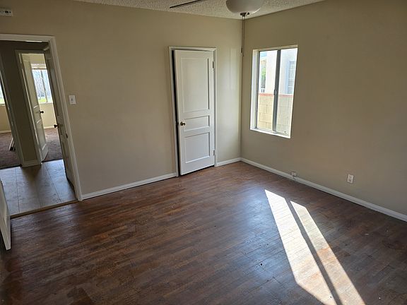 Primary Bedroom. Hardwood floors with closet