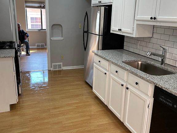 Kitchen looking into dining room. Pantry located behind this view.