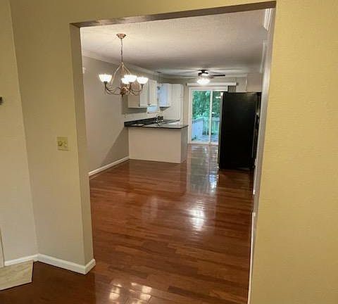 living room into kitchen.