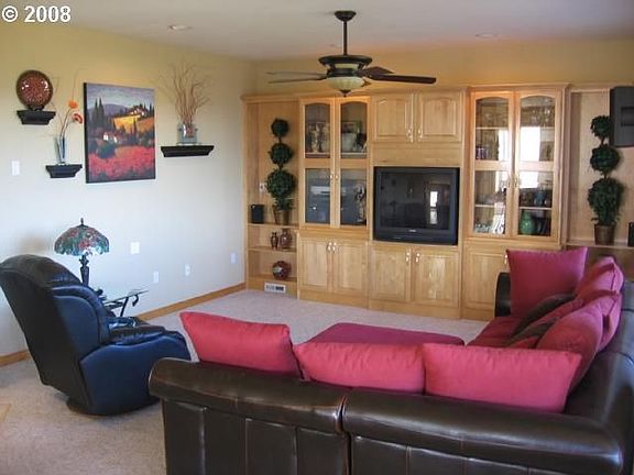 Spacious Living Room Adjoins Open Kitchen