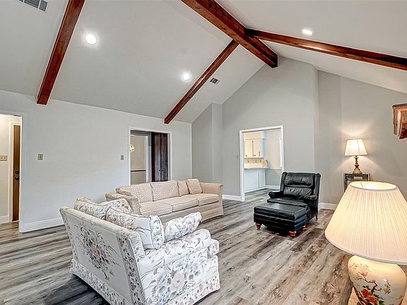 Ceilings feature wooden beams for that farmhouse feel!!