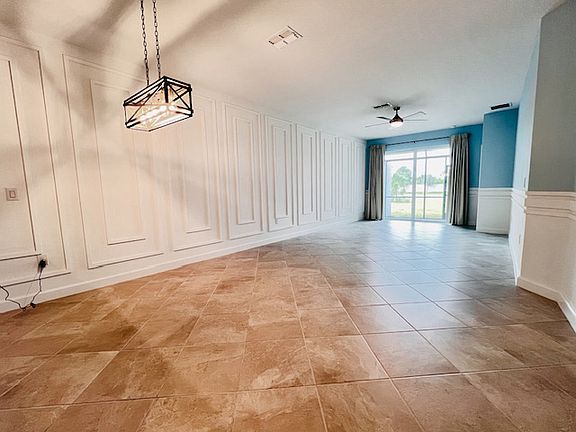 Spacious living room with lovely wood details.