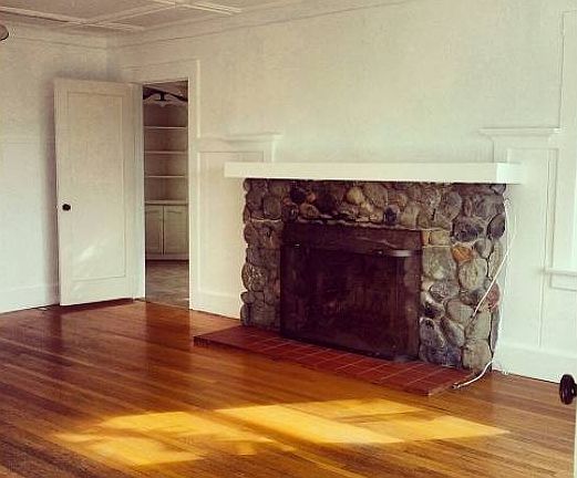 Cozy living room w/ f/p