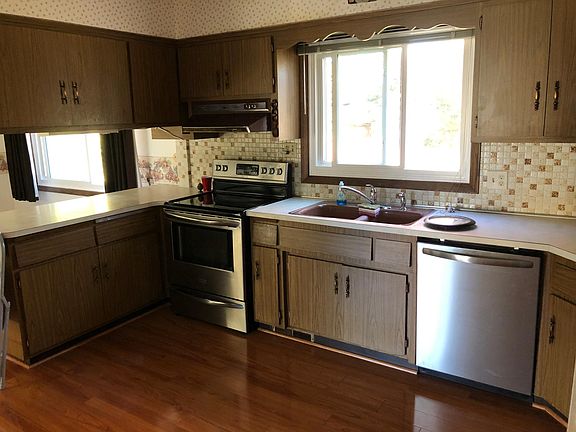 Kitchen with new dishwasher. Stove and Refrigerator included.