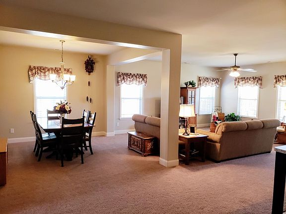 All carpets to be replaced with wood plank flooring