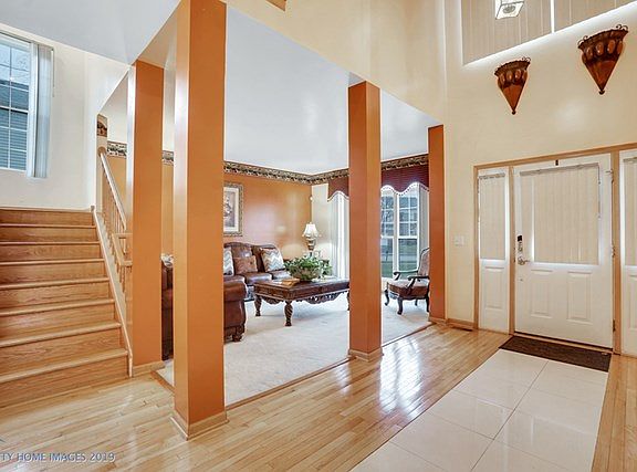 2 story entryway with large windows