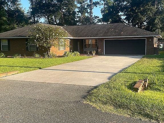 2nd image of 10715 NW Judy Dr
