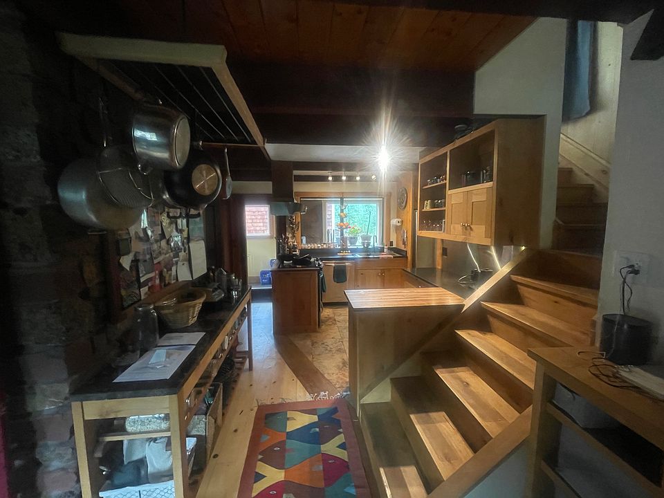 Kitchen and entry.
