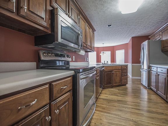 Hardwood through the kitchen and main area. Plenty