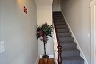 Entry hall to apartment 2 (top-floor unit)