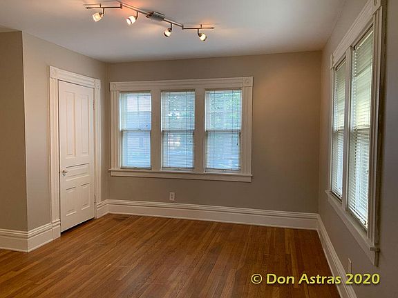 Front office, den or dining room includes closet and overlooks Crescent St.