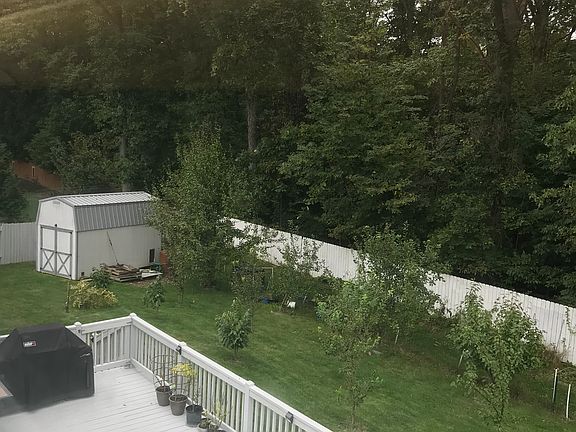 Backyard, deck & Amish shed 