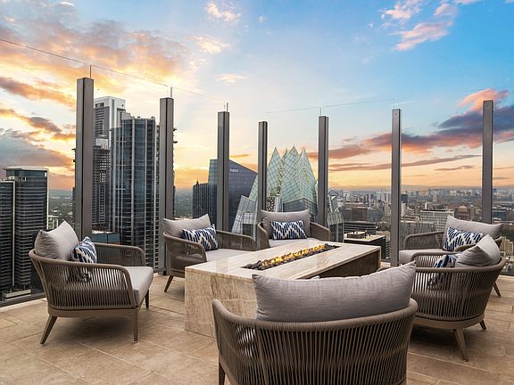 Relaxing rooftop fire pit offering unbeatable views of downtown Austin