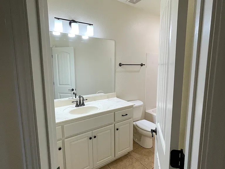 Bathroom with single sink and tub