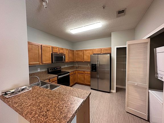 5th image of 6965 Ortega Woods Dr Unit 7