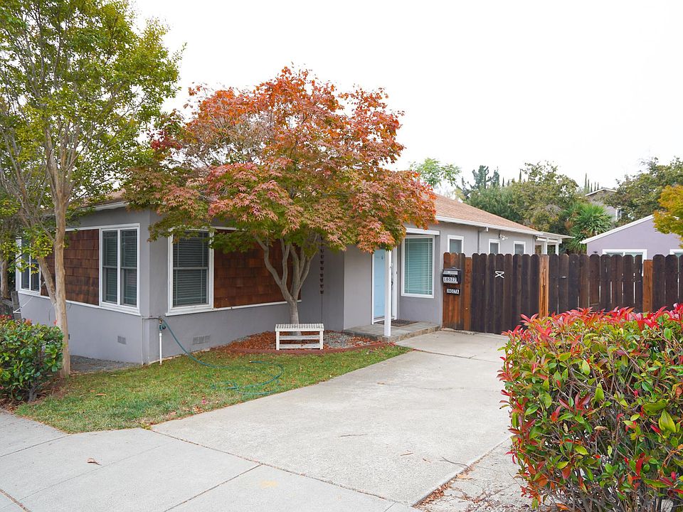 Front of the house with parking spot in drive way