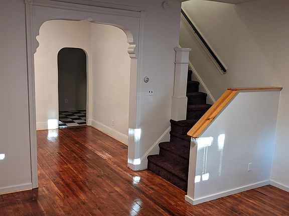 Living room looking into dining room. Refinished hardwood floors. Call Lee 610-547-2429 and leave messages slowly and clearly including first and last name spelled out and return phone number slowly and clearly.
