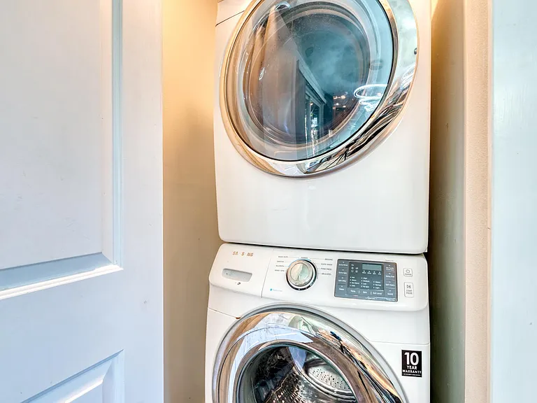Stacked Washer and Dryer off the dining area