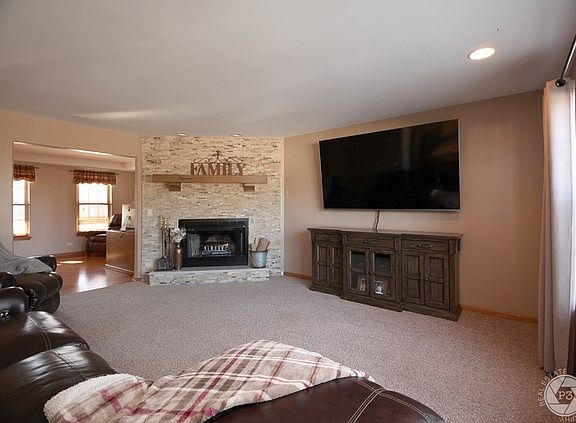 Family Room w/Wood Burning Fireplace