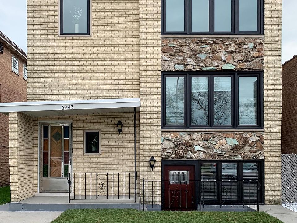 New street view with renovated windows. New front door coming soon to update full front aesthetic.