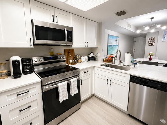 5th image of 5055 Wiles Road Unit 105