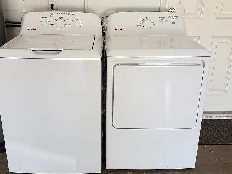 New washer and dryer in garage
