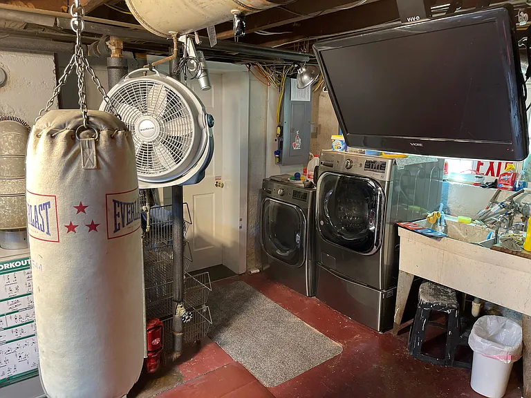 Bunching bag; Extra Fan ; Flat screen TV hooked to DirecTV housing system w/ phone hook ups