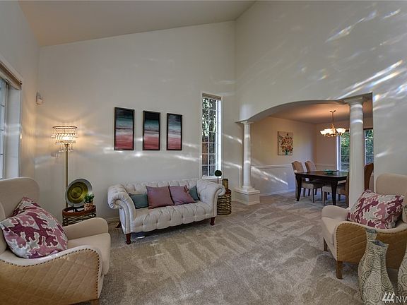 Stunning formal living and dining rooms allow for grand entertaining.