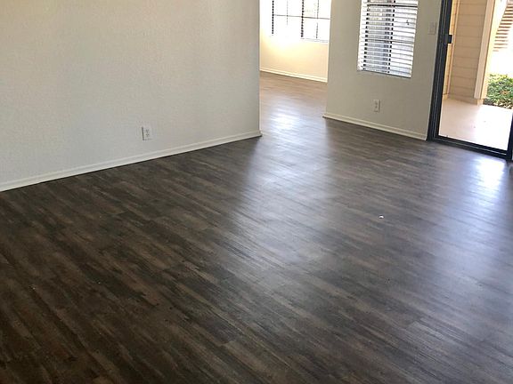 Spacious living room with wood style flooring