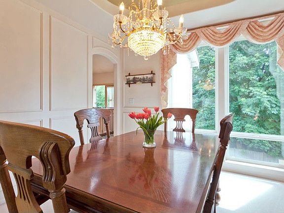 Easily host 10-12 for dinner against a backdrop of peaceful Greenbelt views.