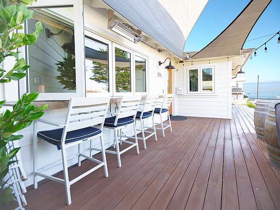 Ocean view BBQ, indoor/outdoor eating area off of kitchen.