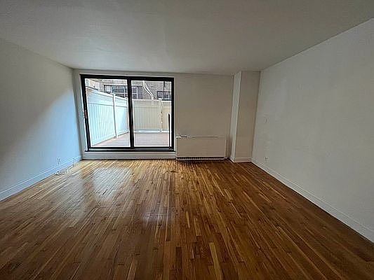 1st image of 123 E 54th St APT 2D
