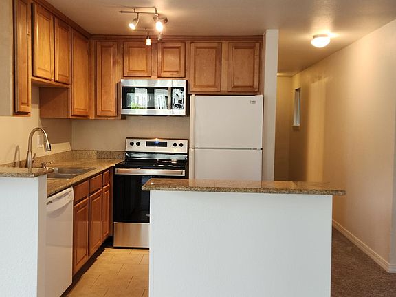 Kitchen & Hall to Entry & Guest Bath/Laundry