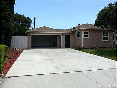 Huge driveway can easily accommodate 4 cars plus 2 car garage!