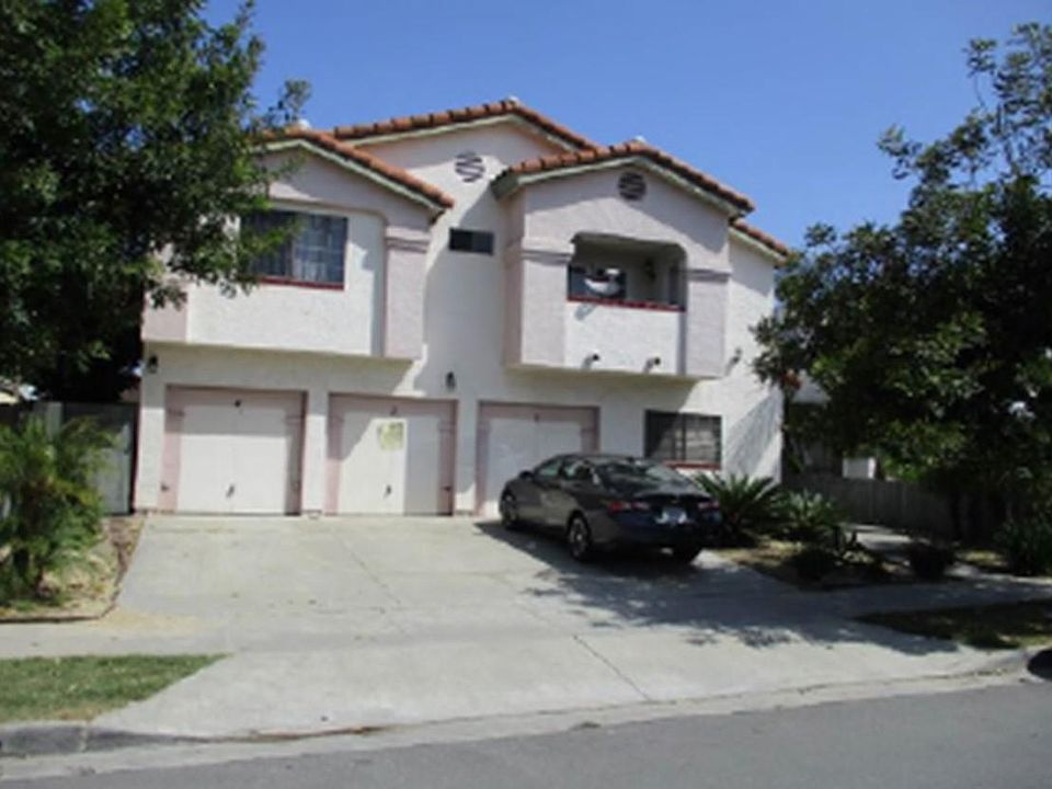 Street View. #4 garage to far left. #4 balcony on top right.