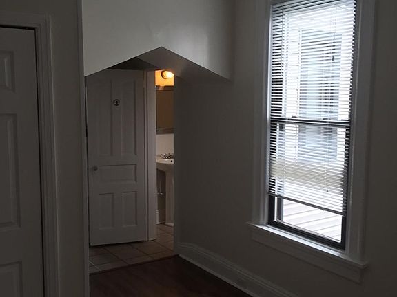 dining room or office room looking at the bathroom door.