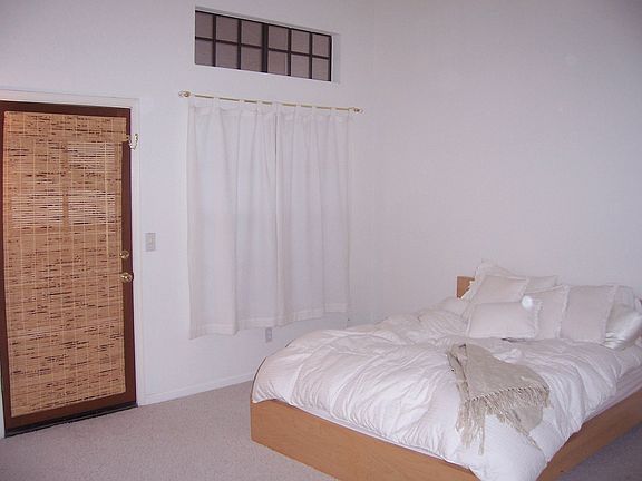 French door out to private balcony off master