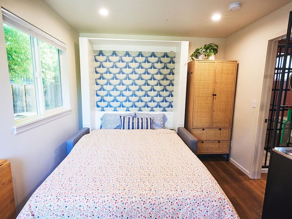 Please note this bed is a murphy bed. In order to take it down, you must remove all cushions from sofa & place them to the side. Then pull the bed down with the provided handles