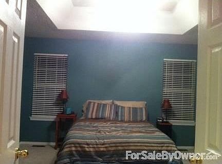 Master Bedroom : Master has double door entry. Tray ceiling and ceiling fan.