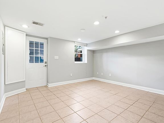 Living room and front entrance.