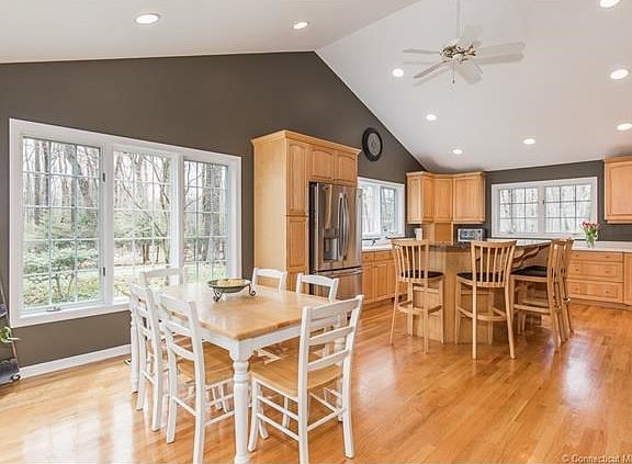 Spectacular kitchen with cathedral ceilings and recessed lighting. Is outstanding condition with new stainless steel appliances and beautiful views of the backyard.