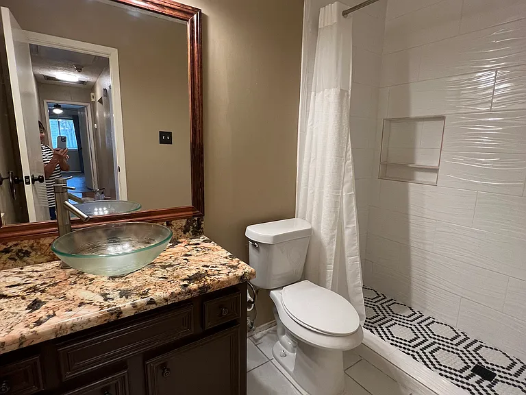 Guest bathroom with newly remodeled walk in shower