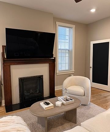Fireplace with antique mantel and gas log with remote control