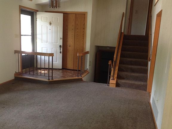 Front door and coat closet