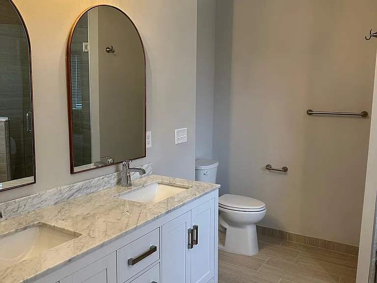Dual Vanities in Primary Suite Bathroom